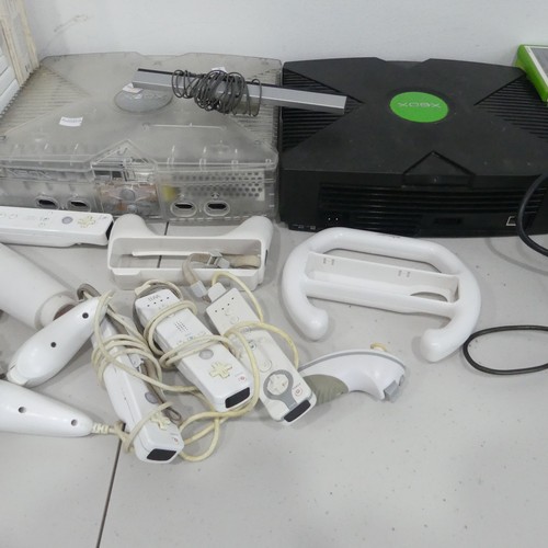 239 - An original Xbox games Console and Controller, together with; an original Xbox 'crystal' Console, a ... 