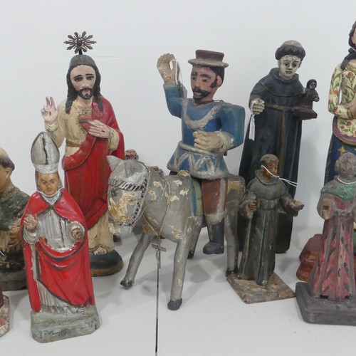 235 - A collection of 19th century and later Guatemalan style Religious folk Statues, including; Saint Jam... 