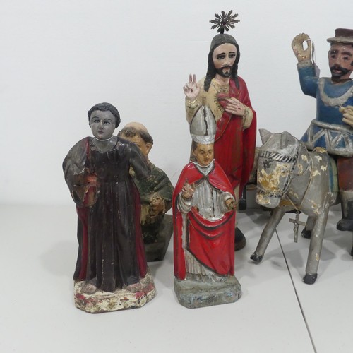 235 - A collection of 19th century and later Guatemalan style Religious folk Statues, including; Saint Jam... 