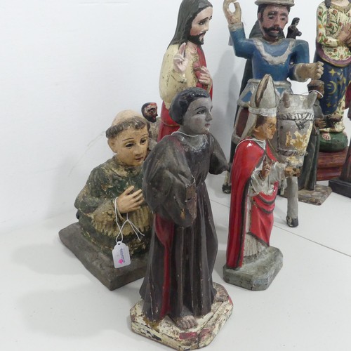 235 - A collection of 19th century and later Guatemalan style Religious folk Statues, including; Saint Jam... 