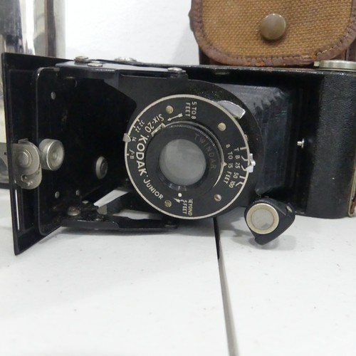 218 - A Koldak Junior six-20 folding Camera, together with a Kalee projection lens seris K f/9, Ikon Kinos... 