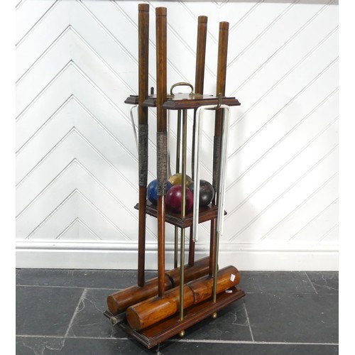 517 - An early 20th century Jaques of London Croquet Set retailed by Harrods, with fitted mahogany stand, ... 