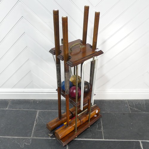 517 - An early 20th century Jaques of London Croquet Set retailed by Harrods, with fitted mahogany stand, ... 