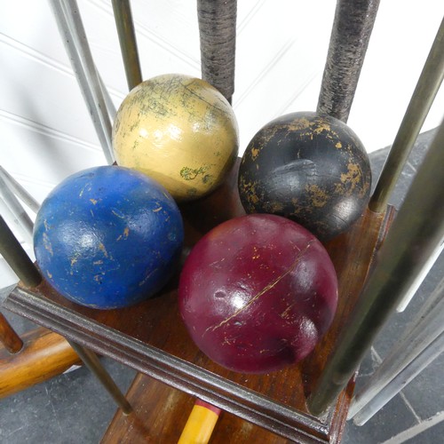 517 - An early 20th century Jaques of London Croquet Set retailed by Harrods, with fitted mahogany stand, ... 