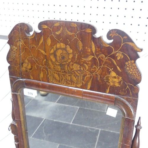 519 - A Queen Anne walnut Toilet Mirror, the carved and moulded pediment painted with stylised flowers and... 