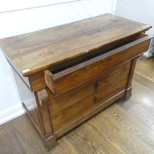 559 - A French 19th century Louis Philippe style mahogany Commode, with four long drawers flanked by scrol... 