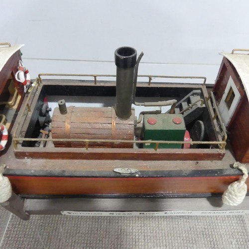 257 - A large scratch built model of a Victorian Steam Launch Boat, fitted with horizontal boiler and lift... 