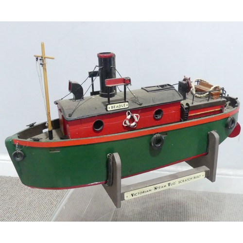 258 - A scratch built painted model of a Victorian steam Tug Boat, with horizontal copper boiler and engin... 