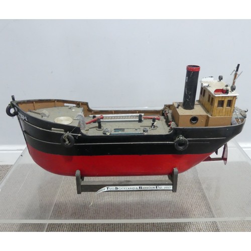 258 - A scratch built painted model of a Victorian steam Tug Boat, with horizontal copper boiler and engin... 