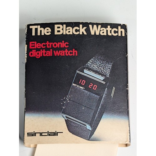 260 - A Sinclair 'The Black Watch' electronic Digital Watch, boxed with outer card slip case, strap discol... 