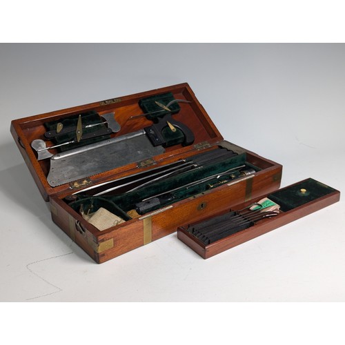 205 - A late 19th/early 20th century Arnold & Sons flame mahogany brass bound cased Field Surgeon's Ki... 