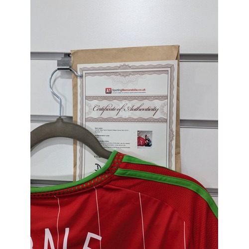 226 - Football; Gareth Bale; A signed Wales replica Home short sleeved Shirt, 2015-16 season, ink signatur... 