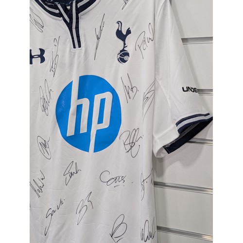 229 - English Football; A Tottenham Hotspur 2013-14 season short sleeved Replica Shirt, signed by 22 squad... 