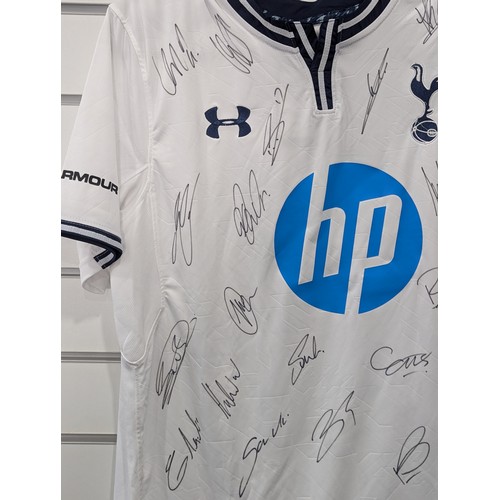 229 - English Football; A Tottenham Hotspur 2013-14 season short sleeved Replica Shirt, signed by 22 squad... 