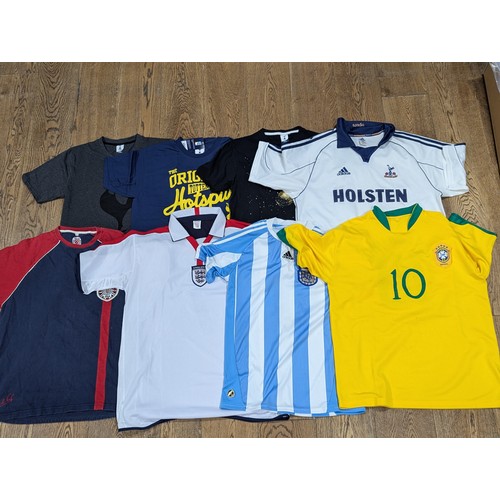 227 - English Football; Tottenham Hotspur; A large collection of replica Shirts and other merchandise, off... 