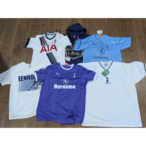 227 - English Football; Tottenham Hotspur; A large collection of replica Shirts and other merchandise, off... 