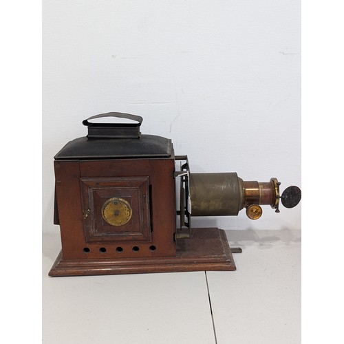 220 - Large brass and mahogany Magic Lantern, c.1890, the lantern of typical form on mahogany base board, ... 