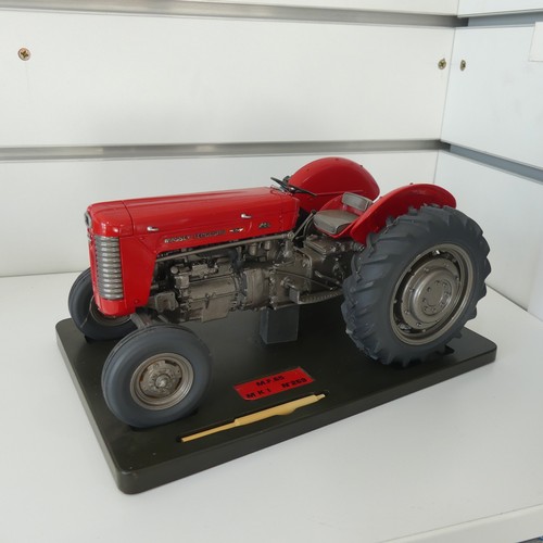 303 - Tractoys 1/16 Farm Issue Massey Ferguson 65 MKI Tractor, limited edition no.269, together with a Bil... 