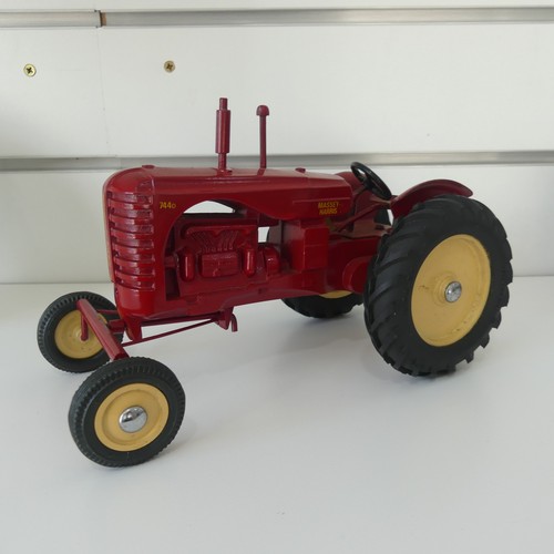 303 - Tractoys 1/16 Farm Issue Massey Ferguson 65 MKI Tractor, limited edition no.269, together with a Bil... 