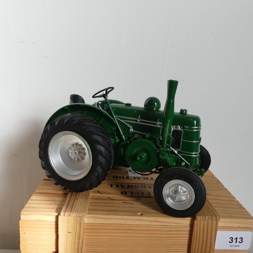 313 - Three Collectable Toys Factory SARL 1:16 scale Tractors, comprising a green Field Marshall in wooden... 