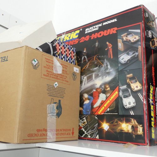 327 - Scalextric; large quantity of including a boxed Le Mans 24 set, various boxed buildings including ow... 