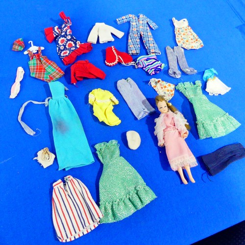 331 - A Pippa Doll, circa 1970s, together with a quantity of original Pippa clothes.