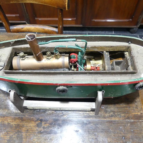 258 - A scratch built painted model of a Victorian steam Tug Boat, with horizontal copper boiler and engin... 