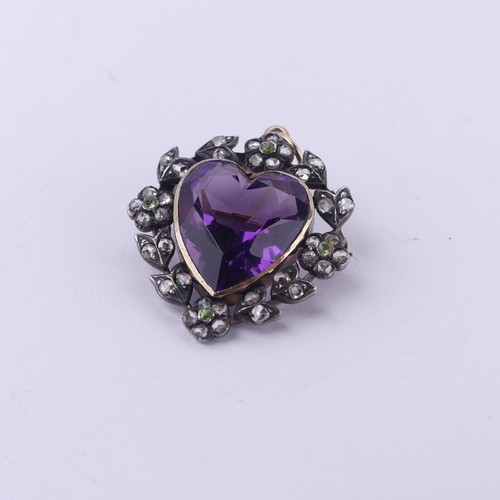  An Edwardian heart shaped Pendant / Brooch, in the Suffragette colours with central facetted heart s... 