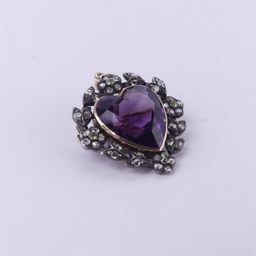  An Edwardian heart shaped Pendant / Brooch, in the Suffragette colours with central facetted heart s... 