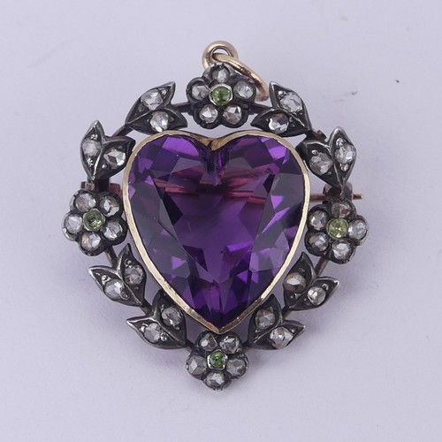  An Edwardian heart shaped Pendant / Brooch, in the Suffragette colours with central facetted heart s... 