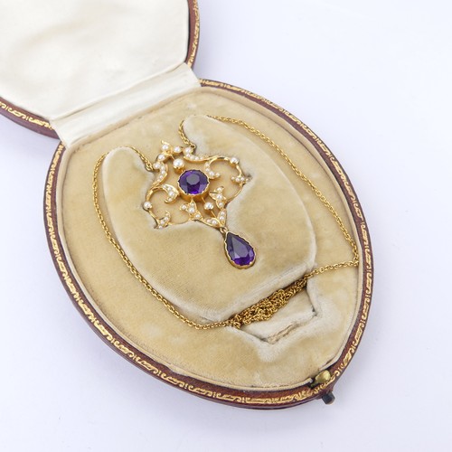  An Edwardian 15ct yellow gold, amethyst and seed pearl Pendant, in the Art Nouveau style, the revers... 