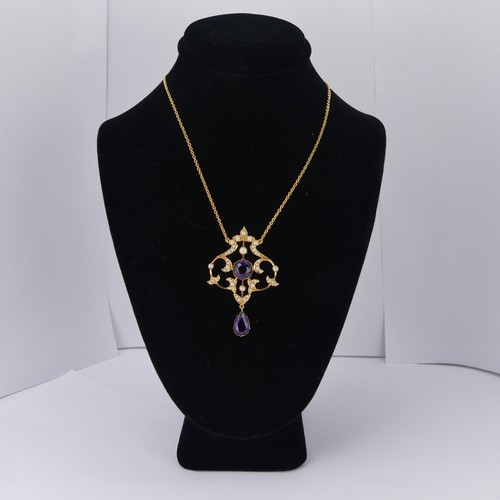  An Edwardian 15ct yellow gold, amethyst and seed pearl Pendant, in the Art Nouveau style, the revers... 