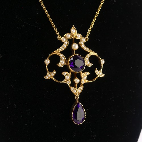  An Edwardian 15ct yellow gold, amethyst and seed pearl Pendant, in the Art Nouveau style, the revers... 