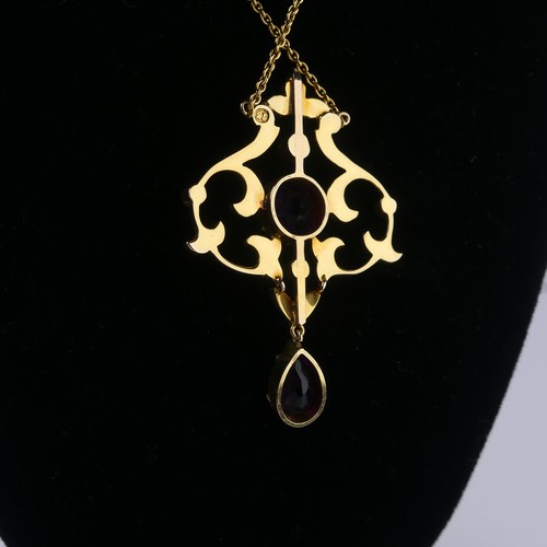  An Edwardian 15ct yellow gold, amethyst and seed pearl Pendant, in the Art Nouveau style, the revers... 