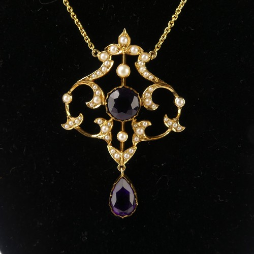  An Edwardian 15ct yellow gold, amethyst and seed pearl Pendant, in the Art Nouveau style, the revers... 