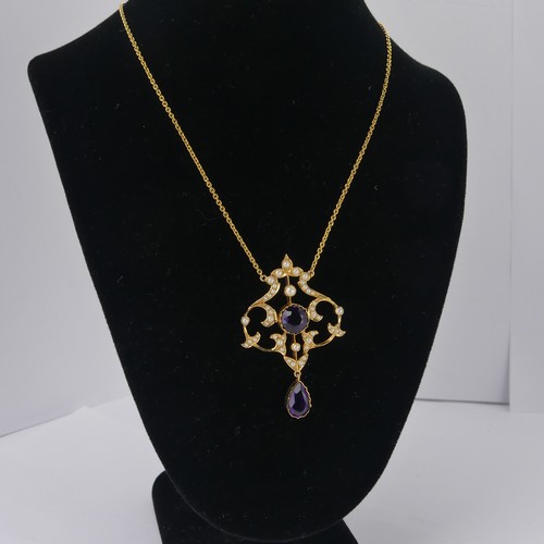  An Edwardian 15ct yellow gold, amethyst and seed pearl Pendant, in the Art Nouveau style, the revers... 