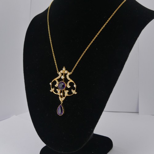  An Edwardian 15ct yellow gold, amethyst and seed pearl Pendant, in the Art Nouveau style, the revers... 