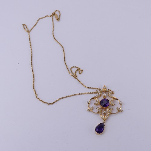  An Edwardian 15ct yellow gold, amethyst and seed pearl Pendant, in the Art Nouveau style, the revers... 