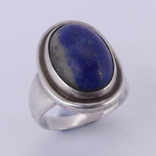 240 - Georg Jensen; A silver and lapis lazuli Ring, designed by Harald Nielsen, no. 46A, with London impor... 