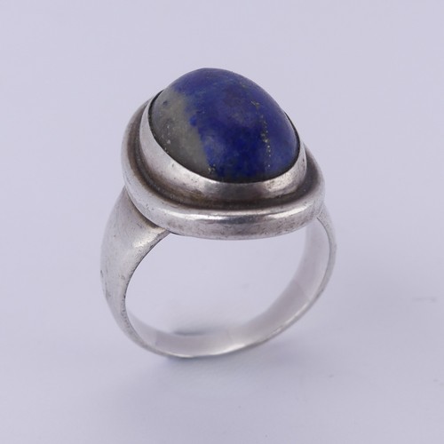 240 - Georg Jensen; A silver and lapis lazuli Ring, designed by Harald Nielsen, no. 46A, with London impor... 