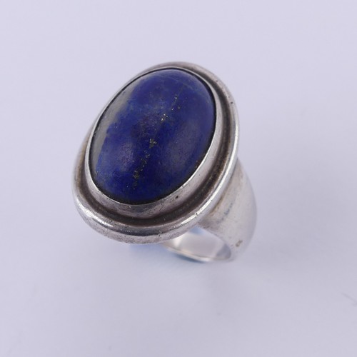 240 - Georg Jensen; A silver and lapis lazuli Ring, designed by Harald Nielsen, no. 46A, with London impor... 