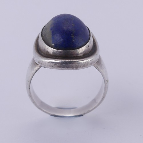 240 - Georg Jensen; A silver and lapis lazuli Ring, designed by Harald Nielsen, no. 46A, with London impor... 