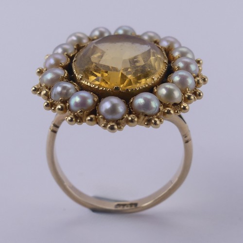 135 - An antique citrine and half pearl Cluster Ring, formed from a brooch, on a 9ct gold ring mount, the ... 