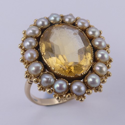 135 - An antique citrine and half pearl Cluster Ring, formed from a brooch, on a 9ct gold ring mount, the ... 