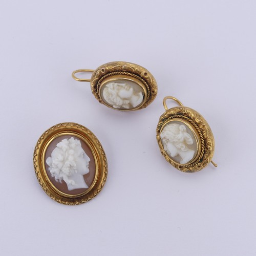 188 - A pair of shell cameo Earrings, with hook fittings, together with an associated cameo brooch, metal ... 