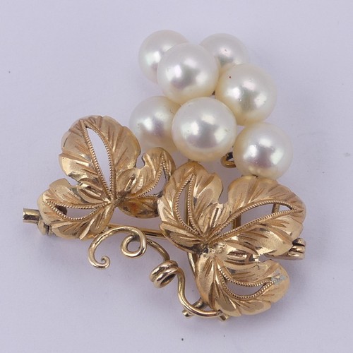 224 - A cultured pearl Brooch, in the form of a fruiting vine, mounted in 14ct yellow gold, 3cm long, 6.9g... 