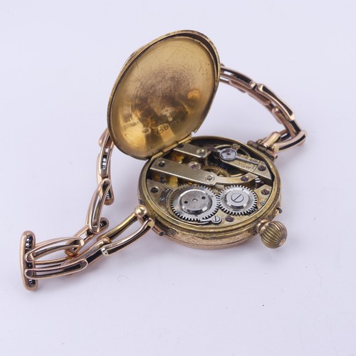 67 - A Continental 14k gold lady's Fob Watch, the pretty enamel dial with blue Arabic numerals, manual cr... 