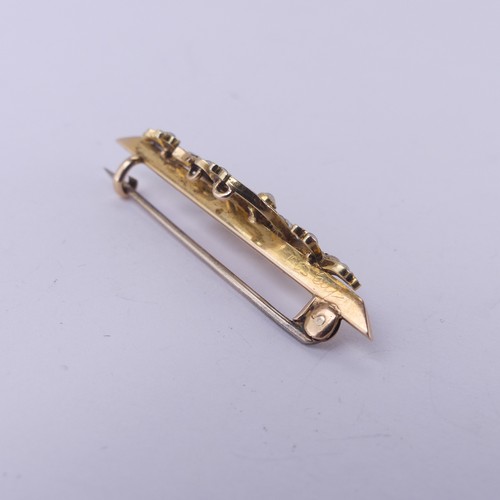 221 - A 15ct yellow gold Bar Brooch, with seed pearl set crescent moon amongst foliage, 4.5cm long, 4.1g.... 