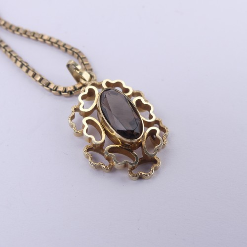 183 - An abstract 9ct yellow gold Pendant, the centre set with an oval facetted smoky quartz, 3cm long, on... 