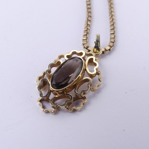 183 - An abstract 9ct yellow gold Pendant, the centre set with an oval facetted smoky quartz, 3cm long, on... 